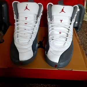 White and gray jordan 12s